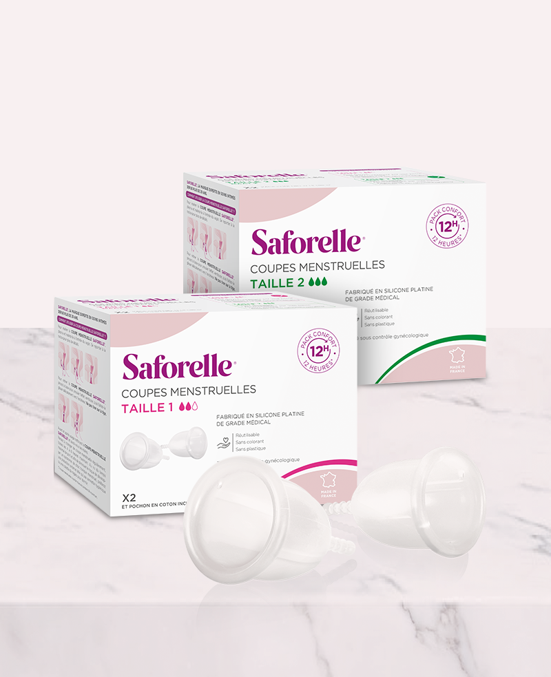Boîtes de coupes menstruelles tailles 1 et 2 avec les coupes à côté, protection hygiénique